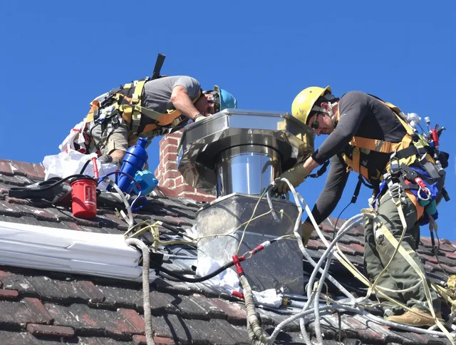 Protective chimney cap installed by Costa Mesa Chimney Sweep in Costa Mesa, CA