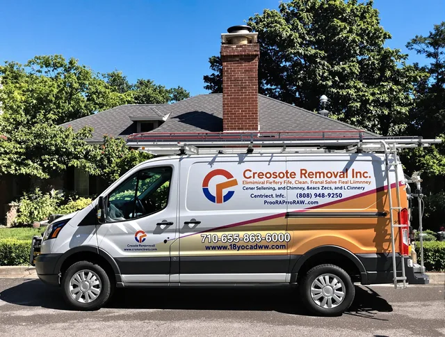 Costa Mesa Chimney Sweep technician removing creosote safely in Costa Mesa, CA