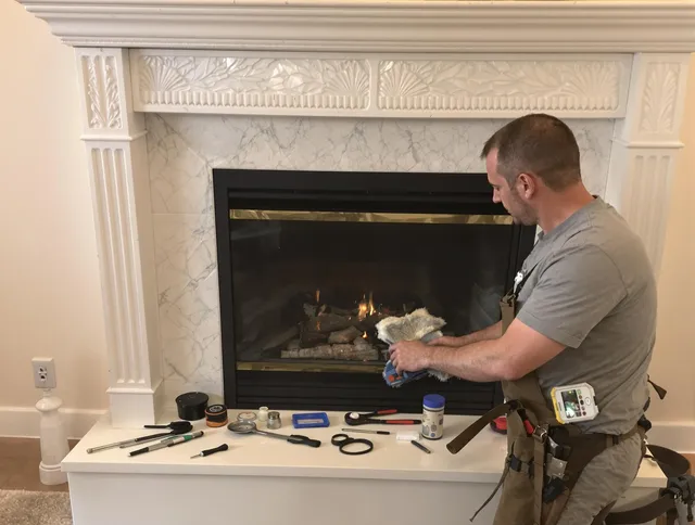 Costa Mesa Chimney Sweep performing fireplace maintenance in Costa Mesa, CA